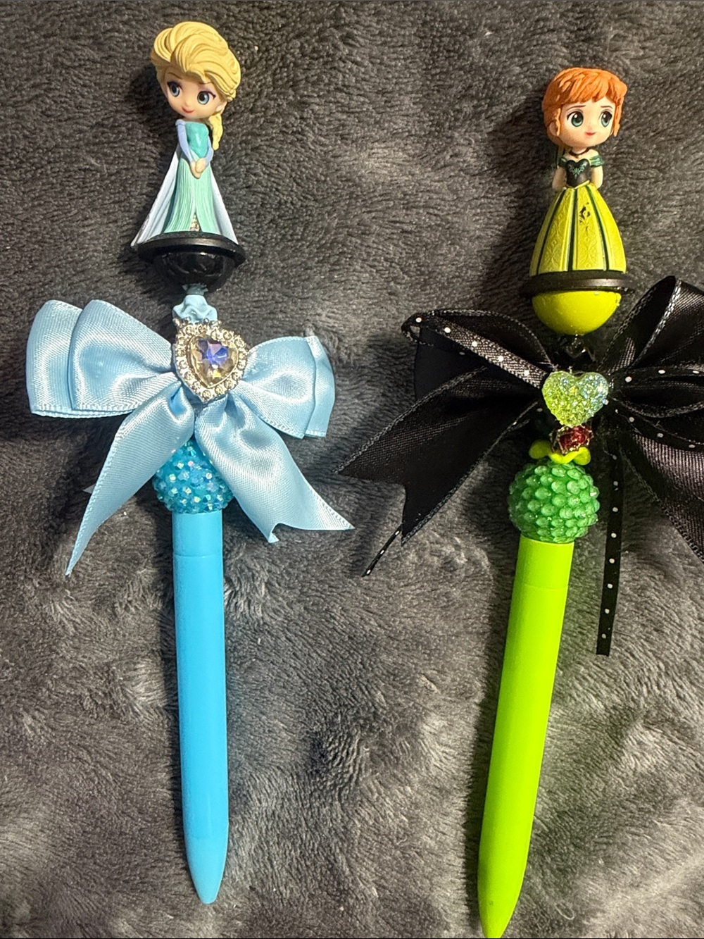 Set of Blue and Lime green beaded pen accented with Elsa & Anna topper.